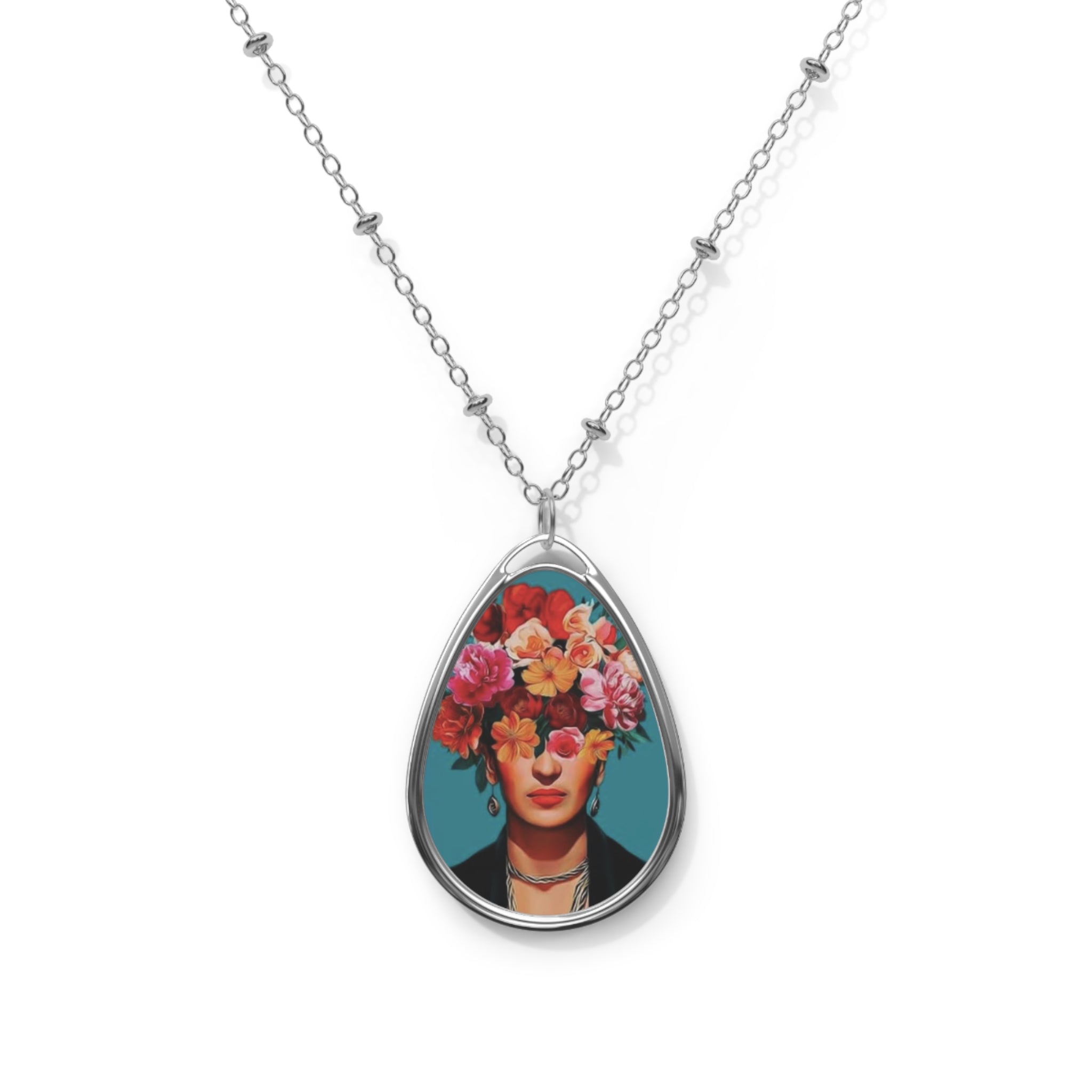 Floral Face Collage Oval Necklace | Frida Kahlo on Teal Background Portrait Pendant | Mexican Art Gifts | Feminist Gifts for Her