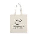 Immigration Is Not a Crime Tote Bag | Protest Statement, Canvas Shopper